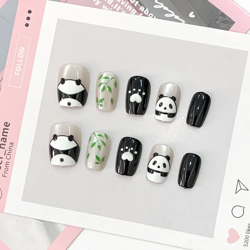 Kreative Kunstnägel mit Pandadesign Karnz
