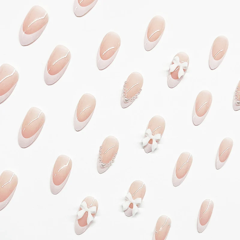 Elegante mit Schleifen verzierten Acryl-Nagelerweiterungen Karnz