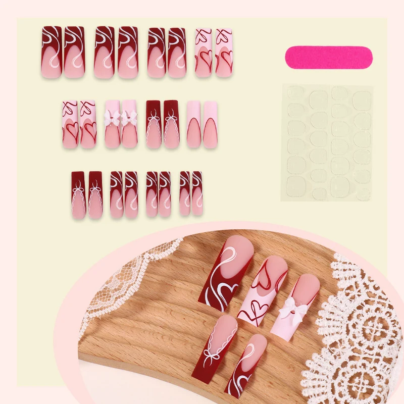 kunstvolles Nagelset mit Herz- und Schleifenmotiven Karnz