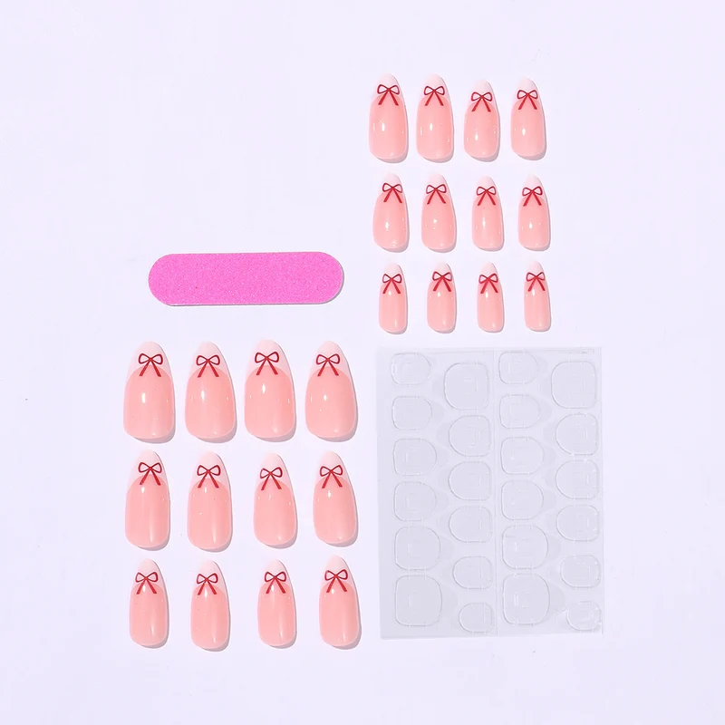 Kunstnagelset mit verspieltem Schleifen-Design Karnz