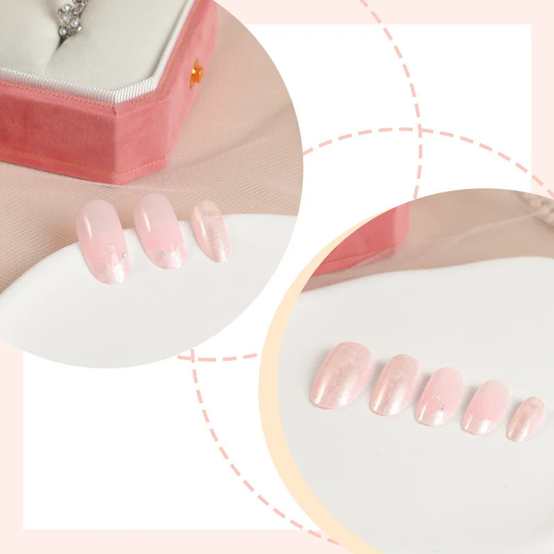 Kunstnagelset mit schimmernden Perl- und glitzernden Akzenten Karnz