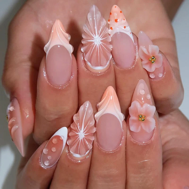 Kunstnagelset mit kreativem Blüten- und Perlen-Design Karnz