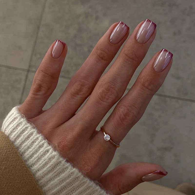 Kunstnagelset mit glamourösem French-Tip-Design Karnz