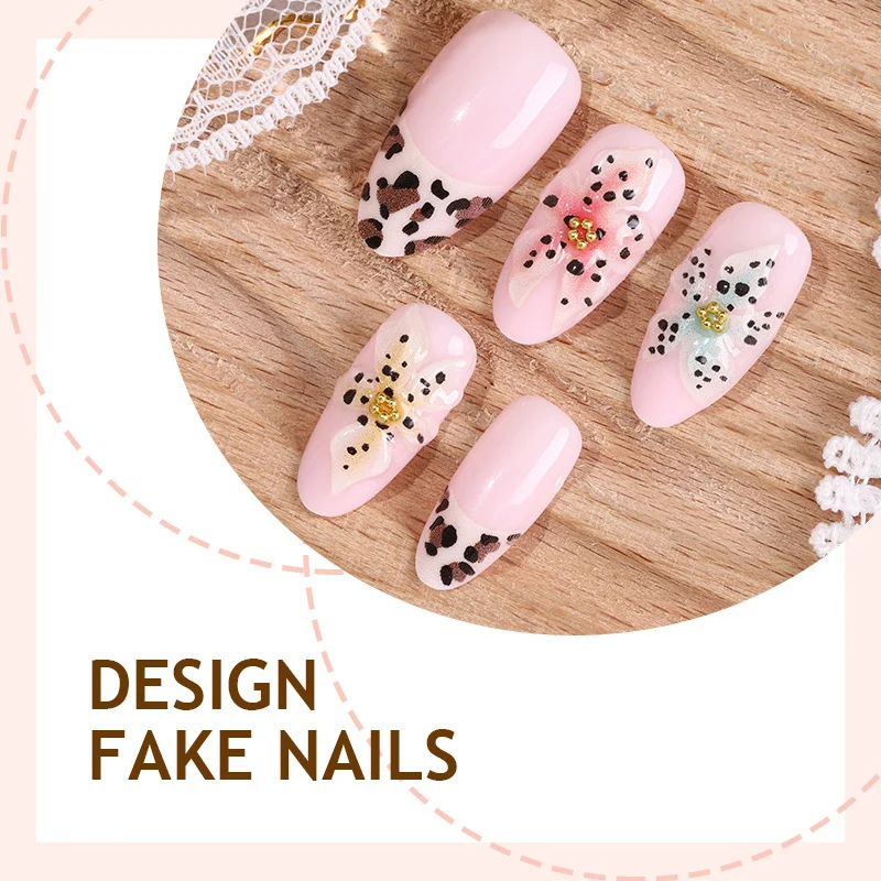 Kunstnagelset mit floralen und tierischen Motiven Karnz
