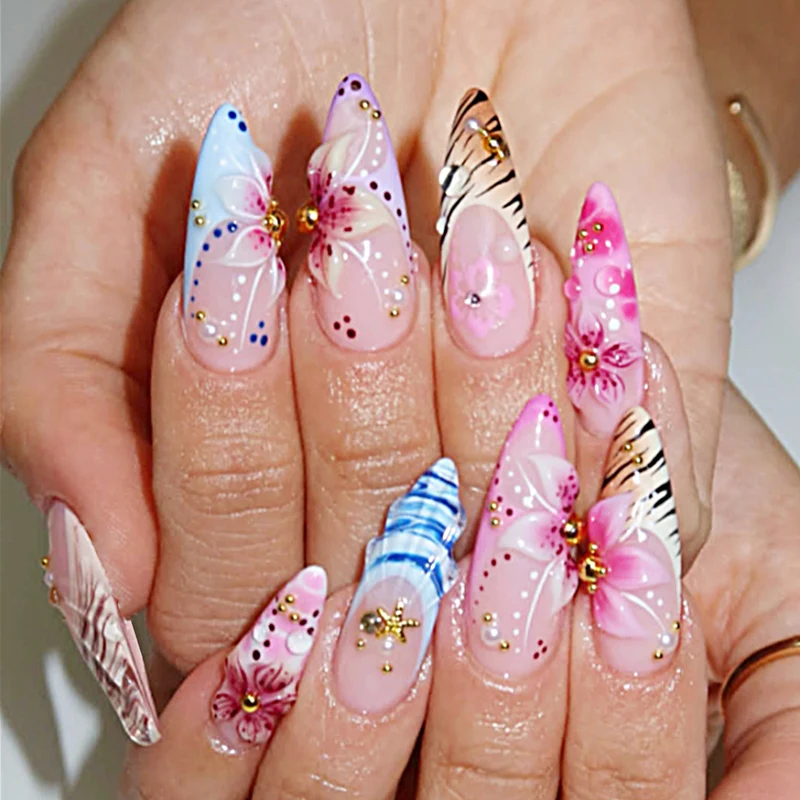 Kunstnagelset mit floralen und kreativen Designs Karnz