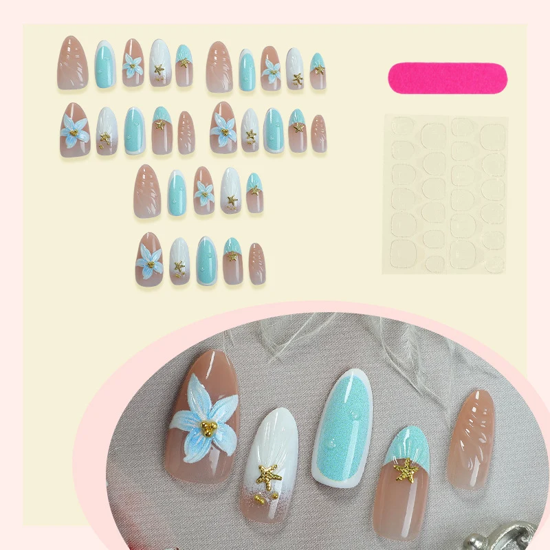 Kunstnagelset mit floralem Design und kunstvollen Verzierungen Karnz