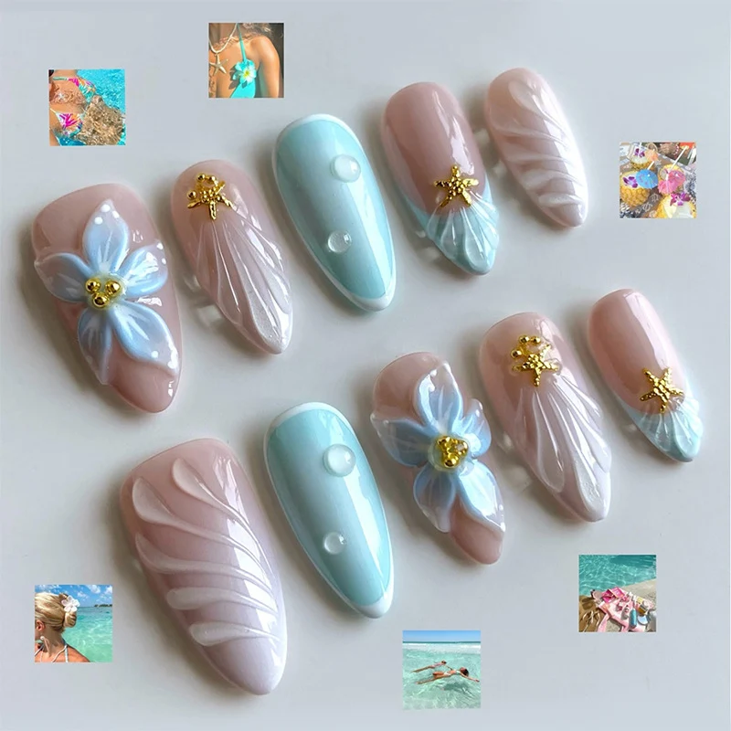 Kunstnagelset mit floralem Design und kunstvollen Verzierungen Karnz
