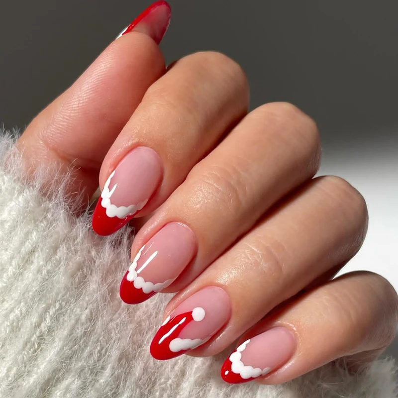 Kunstnagelset mit festlichen Santa-Motiv und Glitzerakzenten Karnz