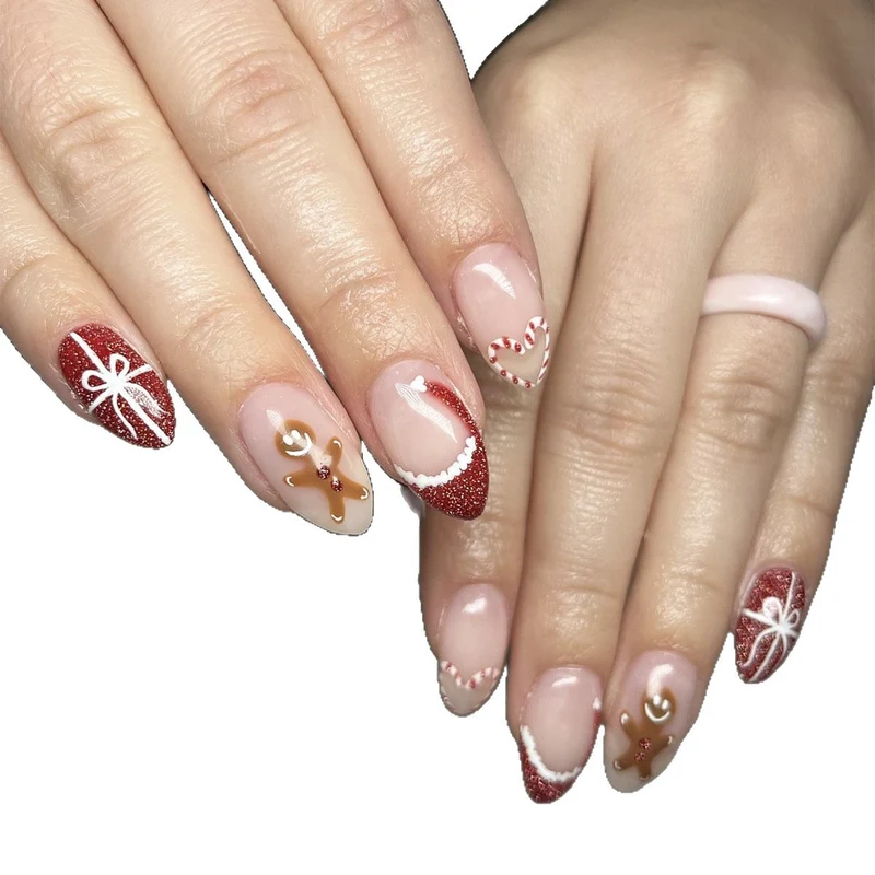 Kunstnagelset mit festlichem Zuckerstangen- und Lebkuchenmuster Karnz