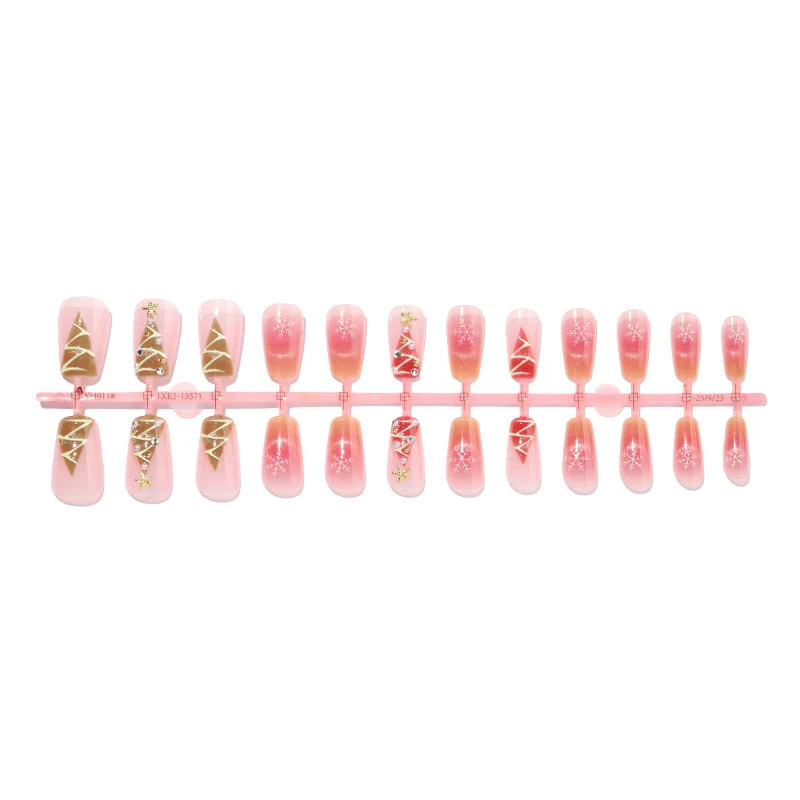 Kunstnagelset mit festlichem Weihnachtsmotiven und Glitzerapplikationen Karnz