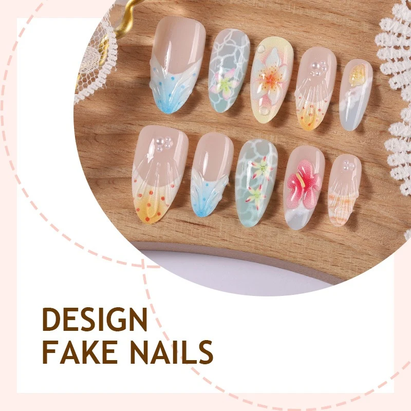 Kunstnagelset mit farbenfrohen Blumen- und maritimen Designs Karnz