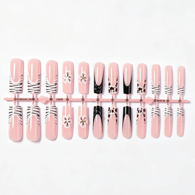 Kunstnagelset mit extravaganten Blumen- und Tierdesigns Karnz