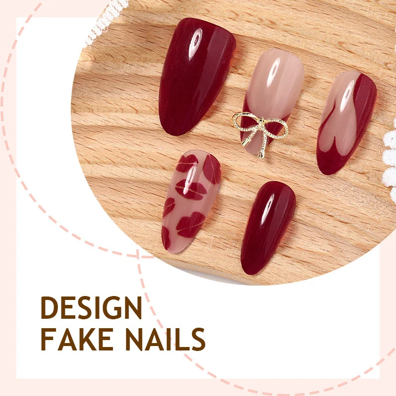 Kunstnagelset mit eleganten Schleifen- und Lippenmotiven Karnz