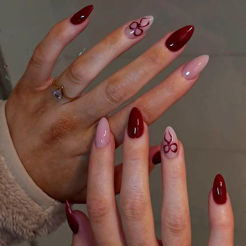 Kunstnagelset mit eleganten Schleifen- und Glitzerakzenten Karnz 1789119024