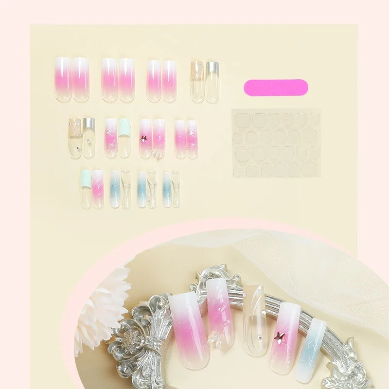 Kunstnagelset mit eleganten Ombre-Designs und Glitzerakzenten Karnz